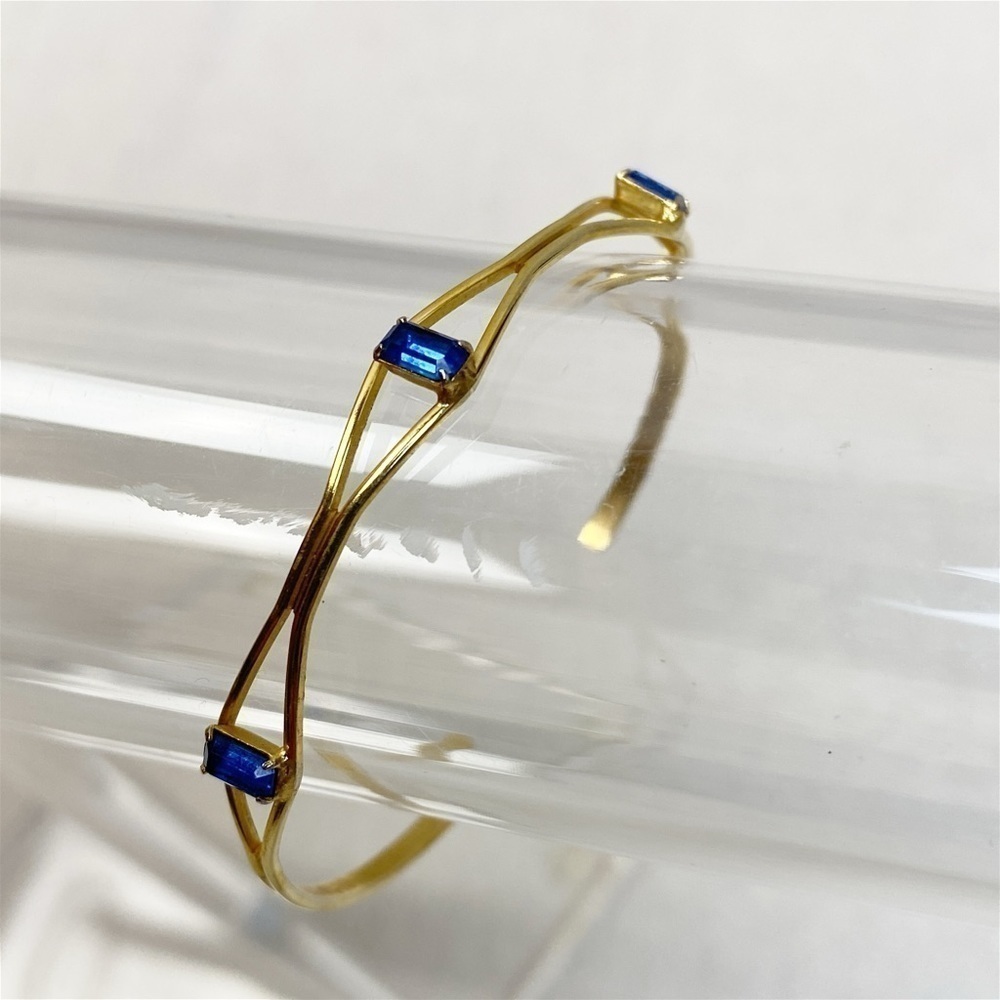 Gold tone delicate Blue emerald cut rhinestone cuff bracelet